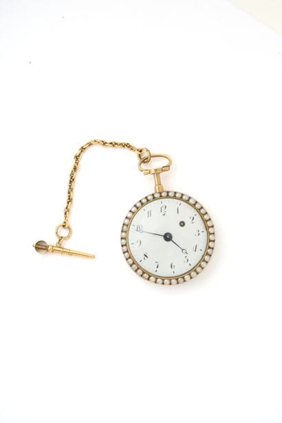 MONTRE à verge en or émaillé (pb. 72 gr)...