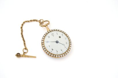 MONTRE à verge en or émaillé (pb. 72 gr)...