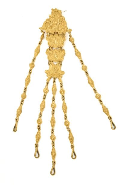 CHATELAINE en laiton doré à quatre maillons...