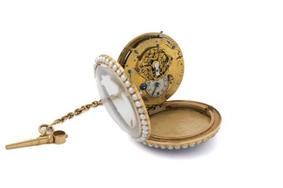 MONTRE à verge en or émaillé (pb. 72 gr)...