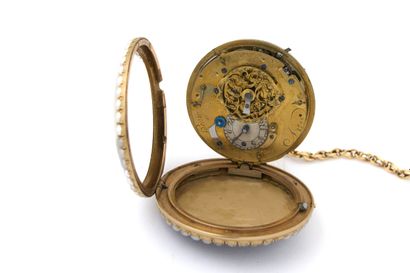 MONTRE à verge en or émaillé (pb. 72 gr)...