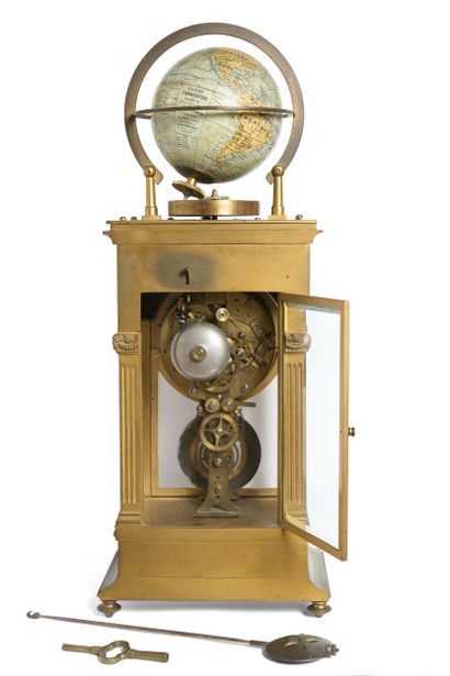 HORLOGE à poser astro-géographique de deux...