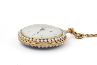 MONTRE à verge en or émaillé (pb. 72 gr)...