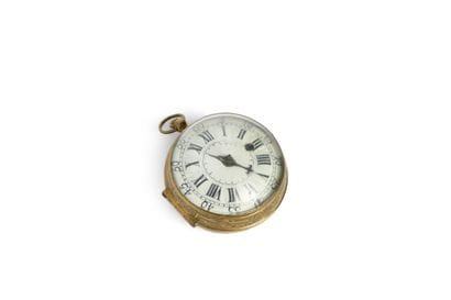MONTRE à verge dite ‘oignon’ en laiton doré...