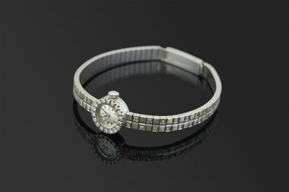 Montre de dame en or gris 18K, 750/°°° lunette...
