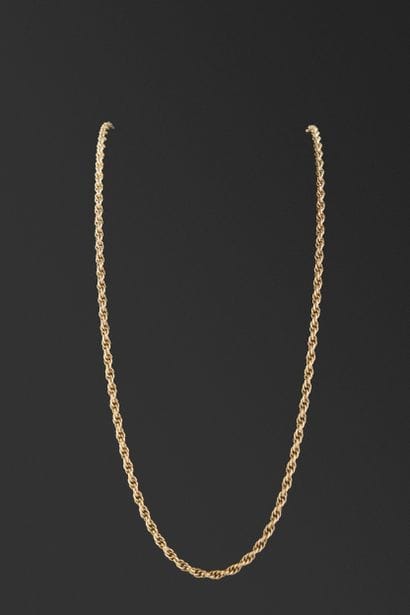 Chaîne en or jaune 18K 750°/°° à maille gourmette...