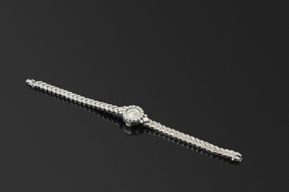 OMEGA. Montre de soirée en or gris 18K, 750/°°°....