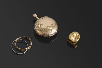 Débris or 18K
Poids: 4,12g

On joint une...
