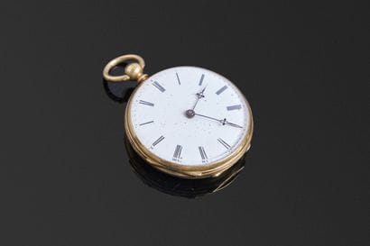 Une montre de poche, boîtier en or jaune...