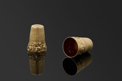 Deux dés à coudre en or jaune 18K 750°/°°,...
