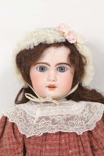 Poupée, tête en porcelaine (restauration...