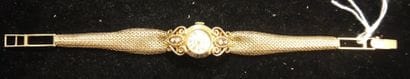Montre-bracelet de dame en or jaune, le cadran...