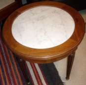 Non présenté
Table basse ronde avec plateau...