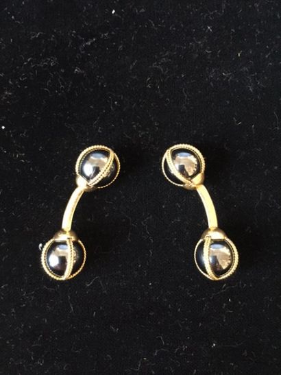 HERMES
Paire de boutons de manchettes en...