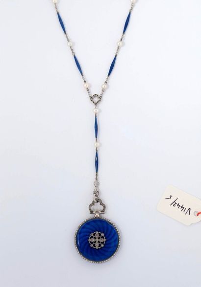 Montre en émail bleu sertie de diamants taillés...