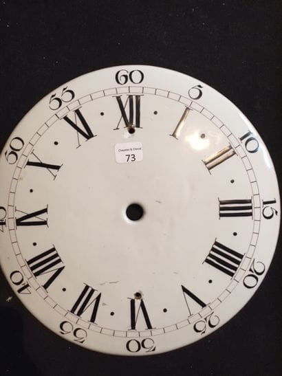 Cadran d'une horloge lanterne en faïence....