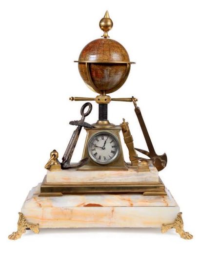 Pendule de cheminée aux attributs de la navigation...