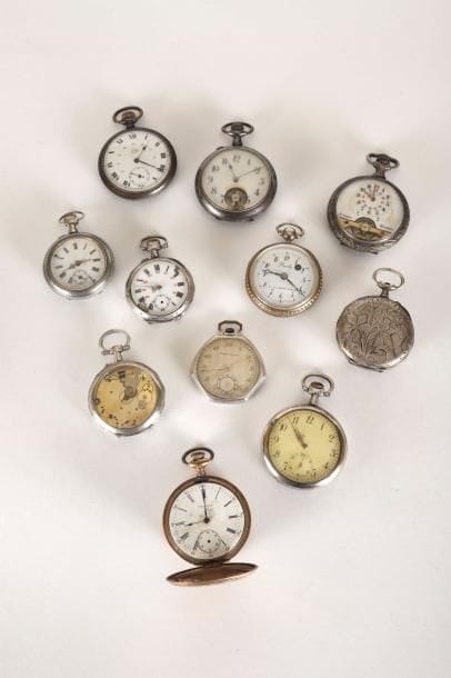 Onze montres de gousset en argent et métal...