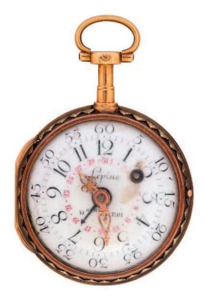 Petite montre à virgule à quantième en ors...