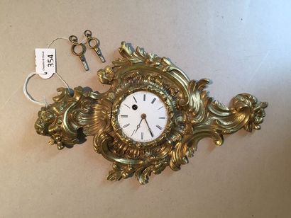 Pendulette murale en bronze doré style rococo...