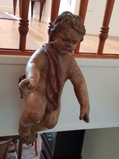Ange (?) ou putto en bois sculpté et peint....
