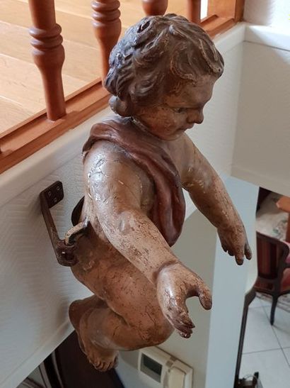 Ange (?) ou putto en bois sculpté et peint....