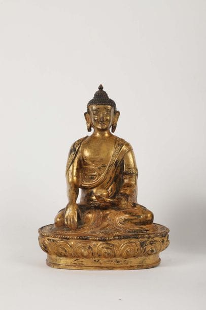Buddha en métal doré

H. 20 cm