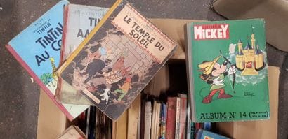 Un carton de bandes dessinées et livres pour...