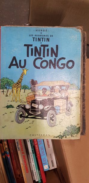 Un carton de bandes dessinées et livres pour...