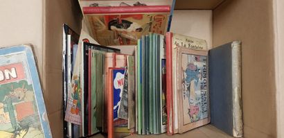 Un carton de bandes dessinées anciennes dont...