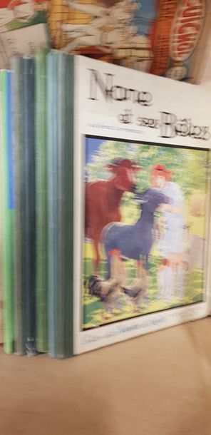 Un carton de bandes dessinées anciennes dont...