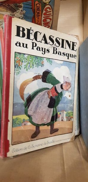 Un carton de bandes dessinées anciennes dont...
