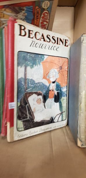 Un carton de bandes dessinées anciennes dont...