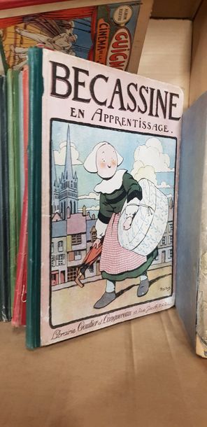 Un carton de bandes dessinées anciennes dont...