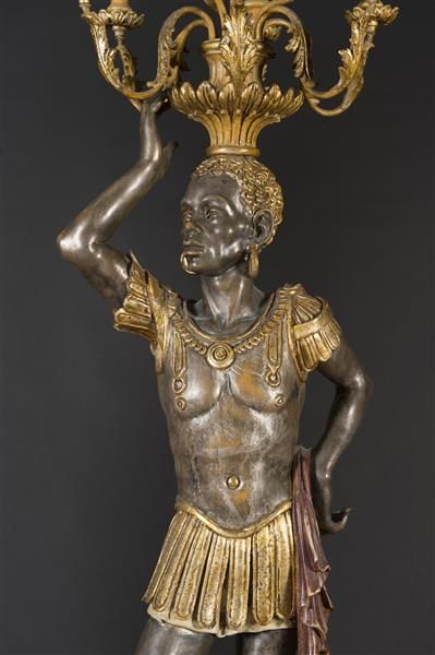 Paire de porte torchères en bois argenté...