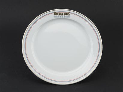 Paul BOCUSE 
Six Assiettes en porcelaine,...