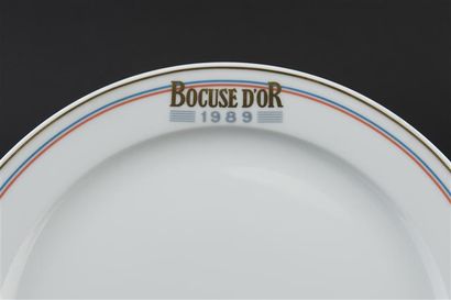 Paul BOCUSE 
Six Assiettes en porcelaine,...