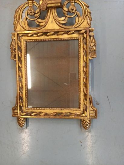 Miroir à fronton en bois doré et laqué
Style...