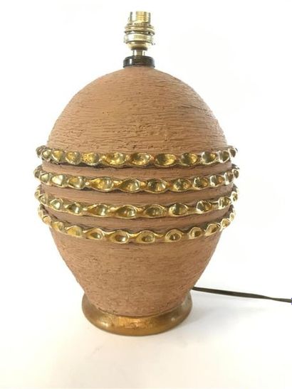 Lampe boule en terre cuite à décor de quatre...