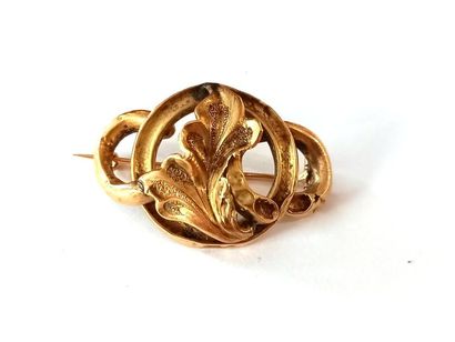 Broche en or jaune, épingle en métal. 
Poids...