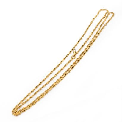 Important sautoir en or jaune 18K (750) maillons...