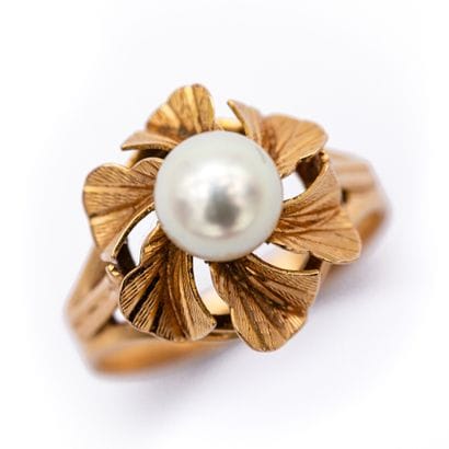 Bague en or jaune (750) 18K ornée d'une perle...