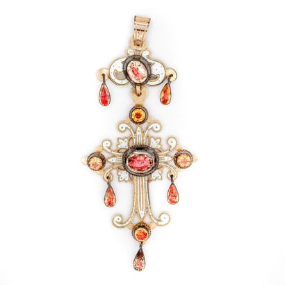 Pendentif croix en or jaune (750) 18K articulée....