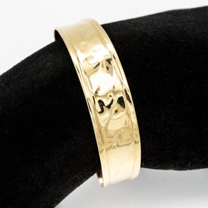 Bracelet jonc ouvert en or jaune (750) 18K...