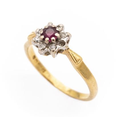 Bague marguerite en or jaune (750) 18K, centrée...