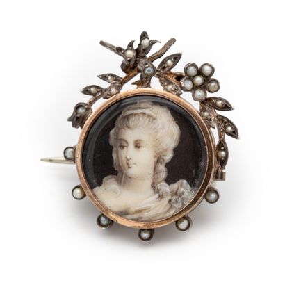 Broche en or 18 K (750) et argent ornée d'une...