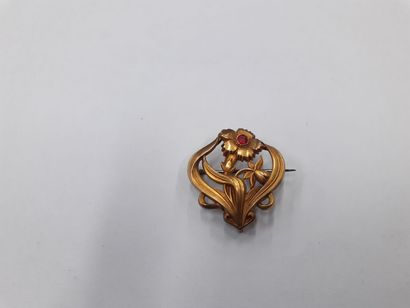 Broche en métal doré 