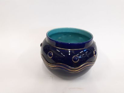 Cache pot en porcelaine à décor bleu d efour...