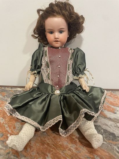 Armand MARSEILLE 
Poupée tête porcelaine...