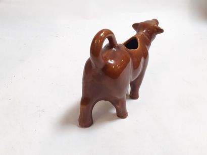 Pot à lait en faïence en forme de vache
H...